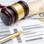 Gavel and Pen on the German Tax Form - Concept for Legal Translation